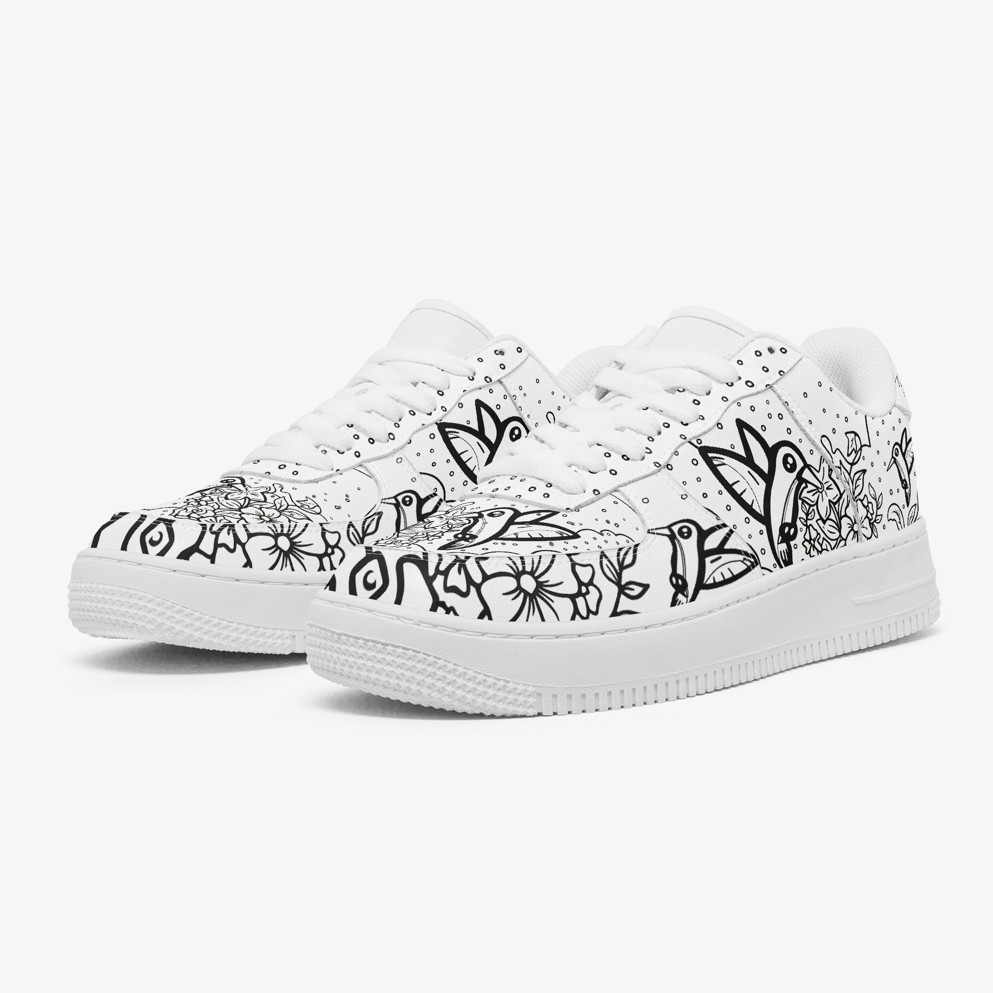 The Hummingbird Effect interactive outline custom sneakers — angled pair view